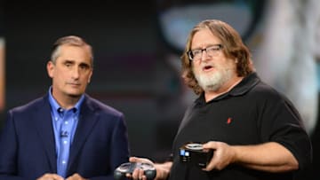 LAS VEGAS, NV - JANUARY 06: Intel Corp. CEO Brian Krzanich (L) looks on as Gabe Newell, co-founder of video game developer and distributor Valve, speaks during Krzanich's keynote address at the 2014 International CES at The Venetian Las Vegas on January 6, 2014 in Las Vegas, Nevada. CES, the world's largest annual consumer technology trade show, runs from January 7-10 and is expected to feature 3,200 exhibitors showing off their latest products and services to about 150,000 attendees. (Photo by Ethan Miller/Getty Images)