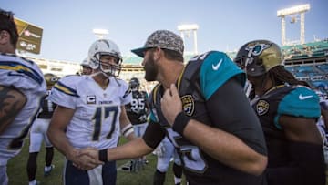 Nov 29, 2015; Jacksonville, FL, USA; San Diego Chargers quarterback Philip Rivers (17) shakes hands with Jacksonville Jaguars quarterback Blake Bortles (5) after a game at EverBank Field. The San Diego Chargers won 31-24. Mandatory Credit: Logan Bowles-USA TODAY Sports