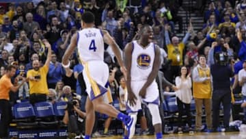 December 18, 2015; Oakland, CA, USA; Golden State Warriors forward Draymond Green (23) celebrates with forward Brandon Rush (4) during the fourth quarter against the Milwaukee Bucks at Oracle Arena. The Warriors defeated the Bucks 121-112. Mandatory Credit: Kyle Terada-USA TODAY Sports