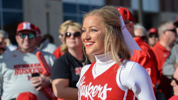 LINCOLN, NE - NOVEMBER 24: A cheerleader for the Nebraska Cornhuskers performs before the game against the Iowa Hawkeyes at Memorial Stadium on November 24, 2017 in Lincoln, Nebraska. (Photo by Steven Branscombe/Getty Images)