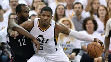 SALT LAKE CITY, UT - APRIL 23: Joe Johnson #6 of the Utah Jazz tries to drive past the defense of Luc Mbah a Moute #12 of the Los Angeles Clippers in the second half of the 105-98 win by the Jazz in Game Four of the Western Conference Quarterfinals during the 2017 NBA Playoffs at Vivint Smart Home Arena on April 23, 2017 in Salt Lake City, Utah. NOTE TO USER: User expressly acknowledges and agrees that, by downloading and or using this photograph, User is consenting to the terms and conditions of the Getty Images License Agreement. (Photo by Gene Sweeney Jr/Getty Images)