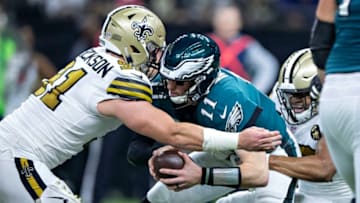 NEW ORLEANS, LA - NOVEMBER 18: Carson Wentz #11 of the Philadelphia Eagles is sacked by Trey Hendrickson #91 of the New Orleans Saints in the second half at Mercedes-Benz Superdome on November 18, 2018 in New Orleans, Louisiana. The Saints defeated the Eagles 48-7. (Photo by Wesley Hitt/Getty Images)