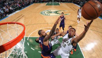 Milwaukee, WI - MARCH 30: Jabari Parker #12 of the Milwaukee Bucks shoots the ball Phoenix Suns on March 30, 2016 at the BMO Harris Bradley Center in Milwaukee, Wisconsin. NOTE TO USER: User expressly acknowledges and agrees that, by downloading and or using this Photograph, user is consenting to the terms and conditions of the Getty Images License Agreement. Mandatory Copyright Notice: Copyright 2016 NBAE (Photo by Gary Dineen/NBAE via Getty Images)
