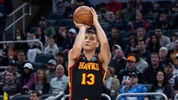 Mar 28, 2022; Indianapolis, Indiana, USA; Atlanta Hawks guard Bogdan Bogdanovic (13) shoots the ball in the first half against the Indiana Pacers at Gainbridge Fieldhouse. Mandatory Credit: Trevor Ruszkowski-USA TODAY Sports