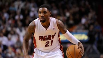 Jan 7, 2014; Miami, FL, USA; Miami Heat shooting guard Roger Mason Jr. (21) dribbles against the New Orleans Pelicans during the first half at American Airlines Arena. The Heat won 107-88. Mandatory Credit: Steve Mitchell-USA TODAY Sports