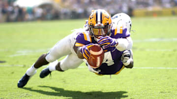 BATON ROUGE, LOUISIANA - OCTOBER 05: Running back John Emery Jr. #4 of the LSU Tigers dives for the endzone during the game against the Utah State Aggies at Tiger Stadium on October 05, 2019 in Baton Rouge, Louisiana. (Photo by Chris Graythen/Getty Images)