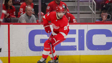 Mar 18, 2023; Detroit, Michigan, USA; Detroit Red Wings defenseman Jake Walman (96) handles the puck during the first period at Little Caesars Arena. Mandatory Credit: Brian Bradshaw Sevald-USA TODAY Sports