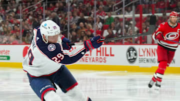 Oct 12, 2022; Raleigh, North Carolina, USA; Columbus Blue Jackets left wing Patrik Laine (29) scores a goal on his shot against the Carolina Hurricanes during the first period at PNC Arena. Mandatory Credit: James Guillory-USA TODAY Sports