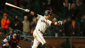 SAN FRANCISCO, CALIFORNIA - MAY 21: Joe Panik #12 of the San Francisco Giants hits a walk-off two-run single in the bottom of the ninth inning against the Atlanta Braves at Oracle Park on May 21, 2019 in San Francisco, California. (Photo by Lachlan Cunningham/Getty Images)