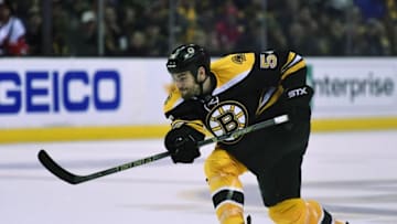 Apr 7, 2016; Boston, MA, USA; Boston Bruins defenseman Adam McQuaid (54) shoots the puck during the second period against the Detroit Red Wings at TD Garden. Mandatory Credit: Bob DeChiara-USA TODAY Sports