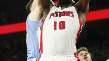Feb 6, 2015; Auburn Hills, MI, USA; Detroit Pistons forward Greg Monroe (10) gets his shot blocked by Denver Nuggets center Jusuf Nurkic (23) during the fourth quarter at The Palace of Auburn Hills. Pistons beat the Nuggets 98-88. Mandatory Credit: Raj Mehta-USA TODAY Sports