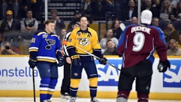 Jan 30, 2016; Nashville, TN, USA; Central Division forward Vladimir Tarasenko (91) of the St. Louis Blues and Central Division forward James Neal (16) of the Nashville Predators react during the 2016 NHL All Star Game Skills Competition at Bridgestone Arena. Mandatory Credit: Christopher Hanewinckel-USA TODAY Sports