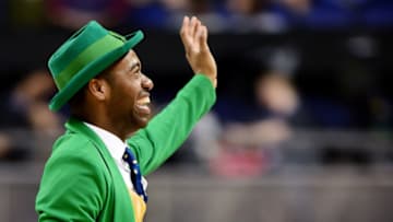 GREENSBORO, NORTH CAROLINA - MARCH 11: The Notre Dame Fighting Irish mascot waves to the crowd during their game against the Boston College Eagles in the second round of the 2020 Men's ACC Basketball Tournament at Greensboro Coliseum on March 11, 2020 in Greensboro, North Carolina. (Photo by Jared C. Tilton/Getty Images)