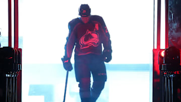 DENVER, COLORADO - OCTOBER 03: Nathan MacKinnon #29 of the Colorado Avalanche takes to the ice during player introductions prior to the game against the Calgary Flames at Pepsi Center on October 03, 2019 in Denver, Colorado. (Photo by Michael Martin/NHLI via Getty Images)