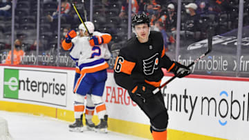 Apr 18, 2021; Philadelphia, Pennsylvania, USA; Philadelphia Flyers defenseman Travis Sanheim (6) skates away as New York Islanders defenseman Nick Leddy (2) celebrates his game winning goal in overtime at Wells Fargo Center. Mandatory Credit: Eric Hartline-USA TODAY Sports
