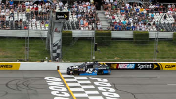 Jun 4, 2016; Long Pond, PA, USA; NASCAR XFINITY Series driver Kyle Larson (42) races during the Pocono Green 250 at Pocono Raceway. Mandatory Credit: Matthew O