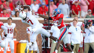 OXFORD, MISSISSIPPI - SEPTEMBER 07: Trey Knox #7 of the Arkansas Razorbacks attempts to catches the ball as Keidron Smith #20 of the Mississippi Rebels defends during the first half of a game at Vaught-Hemingway Stadium on September 07, 2019 in Oxford, Mississippi. (Photo by Jonathan Bachman/Getty Images)