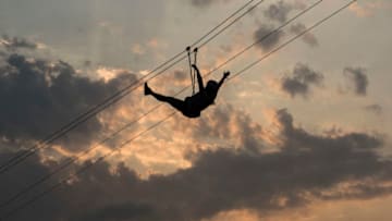 RIO DE JANEIRO, BRAZIL - SEPTEMBER 25: General atmosphere. Fans enjoying the zip-line at day 05 of 2015 Rock in Rio on September 25, 2015 in Rio de Janeiro, Brazil. (Photo by Raphael Dias/Getty Images)