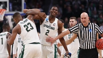 DETROIT, MI - MARCH 16: Xavier Tillman #23 and Jaren Jackson Jr. #2 of the Michigan State Spartans celebrate during the second half against the Bucknell Bison in the first round of the 2018 NCAA Men's Basketball Tournament at Little Caesars Arena on March 16, 2018 in Detroit, Michigan. (Photo by Elsa/Getty Images)