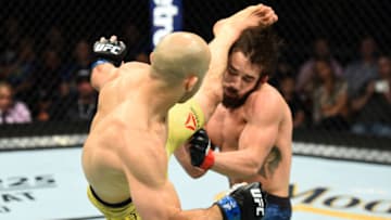 UTICA, NY - JUNE 01: (L-R) Marlon Moraes of Brazil kicks Jimmie Rivera in the head in their bantamweight fight during the UFC Fight Night event at the Adirondack Bank Center on June 1, 2018 in Utica, New York. (Photo by Josh Hedges/Zuffa LLC/Zuffa LLC via Getty Images)