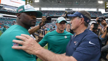 MIAMI, FLORIDA - SEPTEMBER 15: Head coach Brian Flores of the Miami Dolphins and Head coach Bill Belichick of the New England Patriots shake hands after the game at Hard Rock Stadium on September 15, 2019 in Miami, Florida. (Photo by Mark Brown/Getty Images)