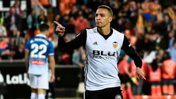 Valencia's Brazilian forward Rodrigo Moreno celebrates after scoring a goal during the Spanish league football match between Valencia CF and RCD Espanyol at the Mestalla stadium in Valencia on April 8, 2018. / AFP PHOTO / JOSE JORDAN (Photo credit should read JOSE JORDAN/AFP/Getty Images)