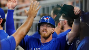ATLANTA, GEORGIA - SEPTEMBER 03: Derek Fisher #20 of the Toronto Blue Jays reacts after scoring on a RBI double by Teoscar Hernandez #37 in the seventh inning against the Atlanta Braves at SunTrust Park on September 03, 2019 in Atlanta, Georgia. (Photo by Kevin C. Cox/Getty Images)