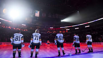 LOS ANGELES, CA - SEPTEMBER 19: Jonathan Marchessault #81, William Karlsson #71, Mark Stone #61, Nate Schmidt #88 and Nicolas Hague #14 of the Vegas Golden Knights listen to the national anthem before the preseason game against the Los Angeles Kings at STAPLES Center on September 19, 2019 in Los Angeles, California. (Photo by Juan Ocampo/NHLI via Getty Images)
