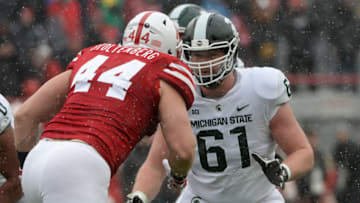 LINCOLN, NE - NOVEMBER 17: Offensive tackle Cole Chewins #61 of the Michigan State Spartans blocks defensive lineman Mick Stoltenberg #44 of the Nebraska Cornhuskers at Memorial Stadium on November 17, 2018 in Lincoln, Nebraska. (Photo by Steven Branscombe/Getty Images)