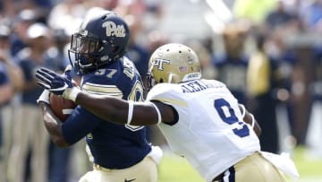 ATLANTA, GA - SEPTEMBER 23: Running back Qadree Ollison #37 of the Pittsburgh Panthers is tackled by linebacker Victor Alexander #9 of the Georgia Tech Yellow Jackets during the game at Bobby Dodd Stadium on September 23, 2017 in Atlanta, Georgia. (Photo by Mike Zarrilli/Getty Images)