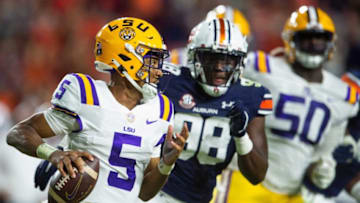 Auburn footballLSU Tigers quarterback Jayden Daniels (5) eludes Auburn Tigers defensive end Marcus Bragg (98) as the Auburn Tigers take on the LSU Tigers at Jordan-Hare Stadium in Auburn, Ala., on Saturday, Oct. 1, 2022.Aulsu17