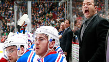 VANCOUVER, BC - DECEMBER 9: Head coach Alain Vigneault of the New York Rangers shouts instructions from the bench against the Vancouver Canucks during their NHL game at Rogers Arena December 9, 2015 in Vancouver, British Columbia, Canada. (Photo by Jeff Vinnick/NHLI via Getty Images)