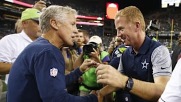 Aug 25, 2016; Seattle, WA, USA; Dallas Cowboys head coach Jason Garrett shakes hands with Seattle Seahawks head coach Pete Carroll following a 27-17 Seattle victory at CenturyLink Field. Mandatory Credit: Joe Nicholson-USA TODAY Sports