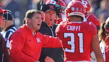 Nov 5, 2016; Piscataway, NJ, USA; Rutgers Scarlet Knights head coach Chris Ash talks to defensive back Anthony Cioffi (31) during a timeout in the first half at High Points Solutions Stadium. Mandatory Credit: Ed Mulholland-USA TODAY Sports