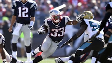 Sep 27, 2015; Foxborough, MA, USA; New England Patriots running back Dion Lewis (33) carries the ball in the first quarter against the Jacksonville Jaguars at Gillette Stadium. New England defeated Jacksonville 51-17. Mandatory Credit: James Lang-USA TODAY Sports