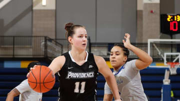 Jovana Nogic dribbles past opponent Courtesy of BIG EAST Conference, Photo Credit: Steve Woltmann