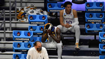 Mar 22, 2021; Indianapolis, Indiana, USA; The Kansas Jayhawks bench react during the second half in the second round of the 2021 NCAA Tournament against the Southern California Trojans at Hinkle Fieldhouse. Mandatory Credit: Patrick Gorski-USA TODAY Sports