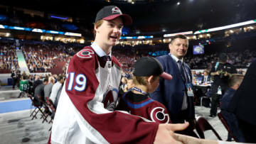 VANCOUVER, BRITISH COLUMBIA - JUNE 22: Drew Helleson reacts after being selected 47th overall by the Colorado Avalanche during the 2019 NHL Draft at Rogers Arena on June 22, 2019 in Vancouver, Canada. (Photo by Bruce Bennett/Getty Images)
