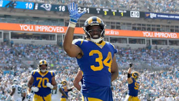 CHARLOTTE, NORTH CAROLINA - SEPTEMBER 08: Malcolm Brown #34 of the Los Angeles Rams waves to the fans after scoring a touchdown against the Carolina Panthers during the third quarter of their game at Bank of America Stadium on September 08, 2019 in Charlotte, North Carolina. (Photo by Grant Halverson/Getty Images)