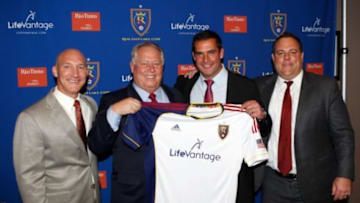 Dec 19, 2013; Salt Lake City, UT, USA; From left Real Salt Lake president Bill Manning , owner Dell Loy Hansen , head coach Jeff Cassar and general manager Garth Lagerway pose for a photo with a jersey during a press conference at Rio Tinto Stadium. Mandatory Credit: Chris Nicoll-USA TODAY Sports