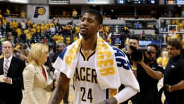 May 28, 2014; Indianapolis, IN, USA; Indiana Pacers forward Paul George (24) leaves the court after game five against the Miami Heat of the Eastern Conference Finals of the 2014 NBA Playoffs at Bankers Life Fieldhouse. Indiana defeats Miami 93-90. Mandatory Credit: Brian Spurlock-USA TODAY Sports