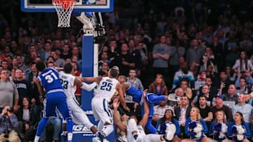 Mar 12, 2016; New York, NY, USA; Seton Hall Pirates guard Isaiah Whitehead (15) shoots the game winning basket over Villanova Wildcats forward Kris Jenkins (2) of the championship game of the Big East conference tournament at Madison Square Garden. Seton Hall won, 69-67. Mandatory Credit: Vincent Carchietta-USA TODAY Sports