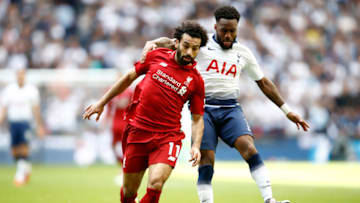 LONDON, ENGLAND - SEPTEMBER 15: Mohamed Salah of Liverpool and Danny Rose of Tottenham Hotspur battle for the ball during the Premier League match between Tottenham Hotspur and Liverpool FC at Wembley Stadium on September 15, 2018 in London, United Kingdom. (Photo by Julian Finney/Getty Images)