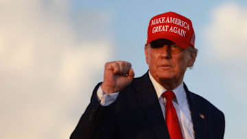 MIAMI, FLORIDA - NOVEMBER 06: Former U.S. President Donald Trump gestures during a rally for Sen. Marco Rubio (R-FL) at the Miami-Dade Country Fair and Exposition on November 6, 2022 in Miami, Florida. Rubio faces U.S. Rep. Val Demings (D-FL) in his reelection bid in Tuesday's general election. (Photo by Joe Raedle/Getty Images)