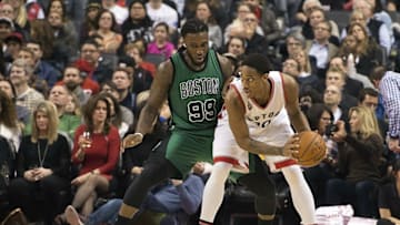 Jan 20, 2016; Toronto, Ontario, CAN; Toronto Raptors guard DeMar DeRozan (10) handles the ball as Boston Celtics forward Jae Crowder (99) tries to defend during the fourth quarter in a game at Air Canada Centre. The Toronto Raptors won 115-109. Mandatory Credit: Nick Turchiaro-USA TODAY Sports