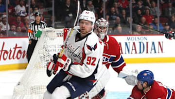 Jan 9, 2017; Montreal, Quebec, CAN; Washington Capitals center Evgeny Kuznetsov (92) reacts after scoring a goal against Montreal Canadiens goalie Carey Price (31) as defenseman Nathan Beaulieu (28) defends during the third period at Bell Centre. Mandatory Credit: Jean-Yves Ahern-USA TODAY Sports