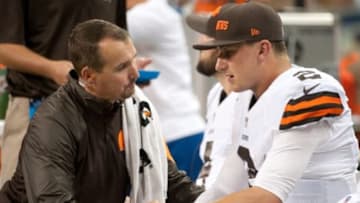 Aug 9, 2014; Detroit, MI, USA; Cleveland Browns staff checks out quarterback Johnny Manziel (2) during the third quarter against the Detroit Lions at Ford Field. Mandatory Credit: Tim Fuller-USA TODAY Sports
