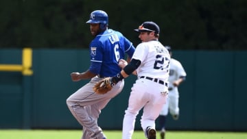 Sep 20, 2015; Detroit, MI, USA; Kansas City Royals center fielder Lorenzo Cain (6) is caught in a pickle and tagged out by Detroit Tigers second baseman Andrew Romine (27) during the first inning at Comerica Park. Mandatory Credit: Tim Fuller-USA TODAY Sports