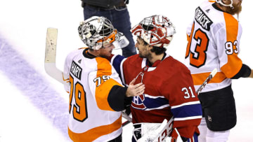 Carter Hart #79 of the Philadelphia Flyers and Carey Price #31 of the Montreal Canadiens (Photo by Elsa/Getty Images)