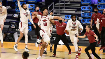 Arkansas Razorbacks forward Jaylin Williams (10) celebrates after defeating the Texas Tech Red Raiders in the second round of the 2021 NCAA Tournament at Hinkle Fieldhouse. Mandatory Credit: Marc Lebryk-USA TODAY Sports